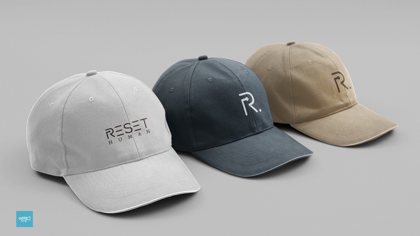 Bonés com a marca Reset Human em branco, azul e bege